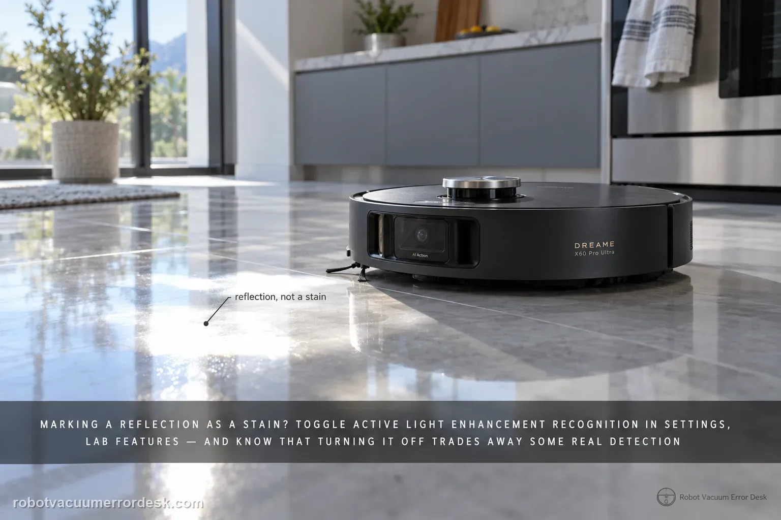 A Dreame X60 Pro Ultra stopped at the edge of a bright glare patch on glossy reflective kitchen tile as if it found a stain.