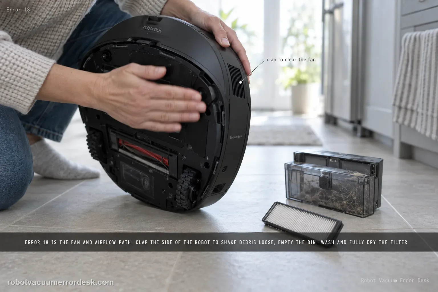 Two hands holding a Roborock Saros 20 Sonic on its side and clapping the flank, the open dustbin and filter on the floor nearby, Error 18 tagged in the corner.